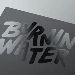 Spot UV business card with glossy logo accent on matte finish